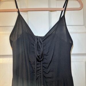 Mahina Black Jumpsuit ankle length with adjustable neckline.